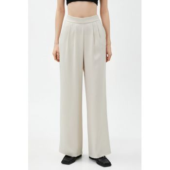 Pantaloni cu croiala ampla si talie inalta
