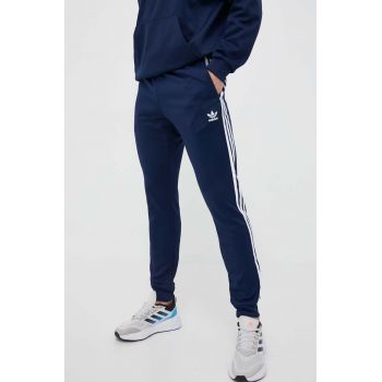 adidas Originals pantaloni de trening culoarea albastru marin, neted