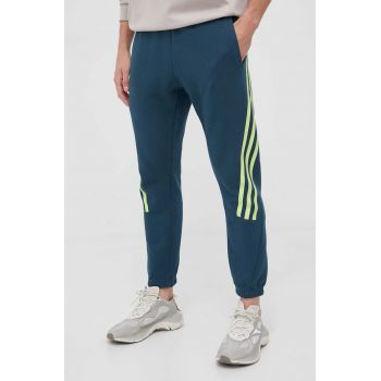 adidas pantaloni de trening culoarea turcoaz, cu imprimeu