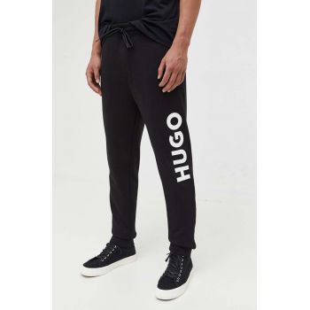 HUGO pantaloni de trening din bumbac culoarea negru, cu imprimeu