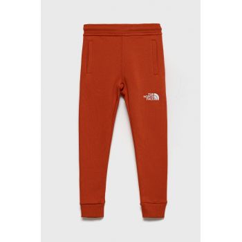 The North Face Pantaloni de bumbac pentru copii culoarea portocaliu, cu imprimeu