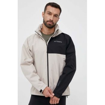 adidas TERREX geaca de ploaie Multi RAIN.RDY barbati, culoarea bej de firma originala