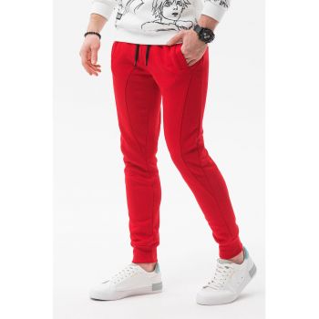 Pantaloni sport cu cusaturi accentuate