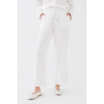 Pantaloni ampli cu buzunare oblice