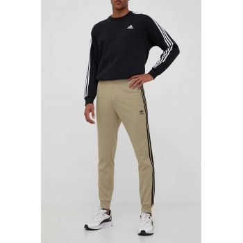 adidas Originals pantaloni de trening culoarea bej, cu imprimeu ieftini