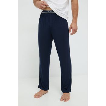 BOSS pantaloni de pijama barbati, culoarea albastru marin, neted
