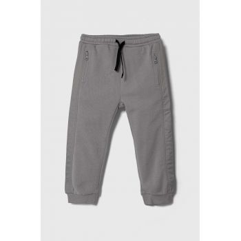 Sisley pantaloni de trening din bumbac pentru copii culoarea gri, neted