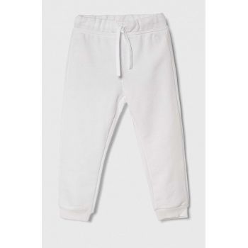 United Colors of Benetton pantaloni de trening din bumbac pentru copii culoarea alb, neted