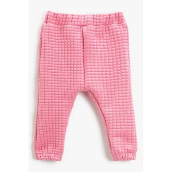 Pantaloni texturati cu mansete elastice