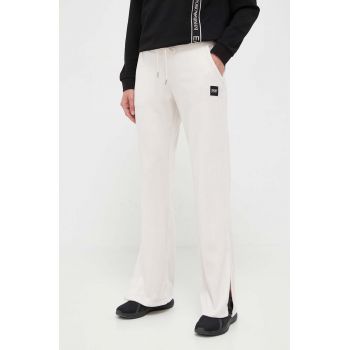 Dkny pantaloni de trening culoarea bej, neted de firma original