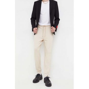 HUGO pantaloni de trening din bumbac culoarea bej, neted, 50489617