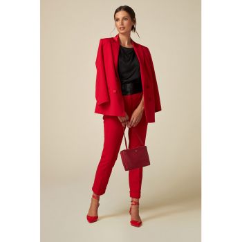 Pantaloni cu croiala conica si buzunare laterale