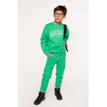 Coccodrillo pantaloni de trening din bumbac pentru copii culoarea verde, neted
