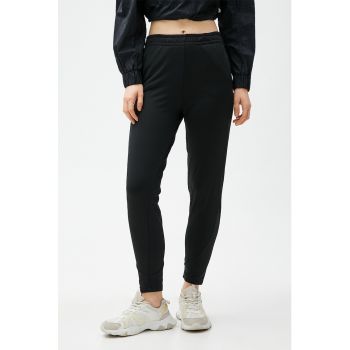 Pantaloni sport crop conici