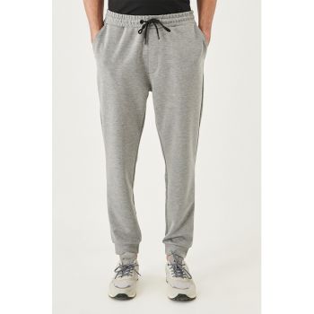 Pantaloni sport cu snur si buzunare oblice