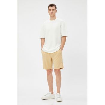 Pantaloni scurti cu buzunare laterale