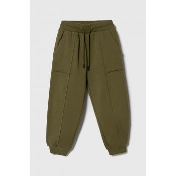 Sisley pantaloni de trening pentru copii culoarea verde, neted