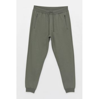 Pantaloni sport cu buzunare cu fermoar