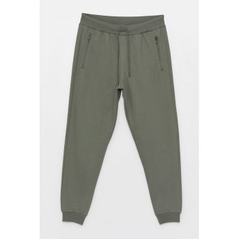 Pantaloni de trening cu buzunare cu fermoar