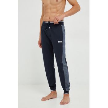 BOSS pantaloni de trening barbati, culoarea albastru marin, neted