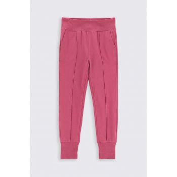 Coccodrillo pantaloni de trening din bumbac pentru copii culoarea roz, neted