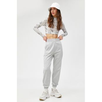 Pantaloni sport cu buzunare laterale