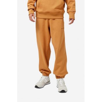 New Balance pantaloni de trening din bumbac culoarea portocaliu, uni ieftini