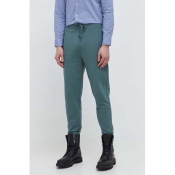 HUGO pantaloni de trening din bumbac culoarea verde, neted