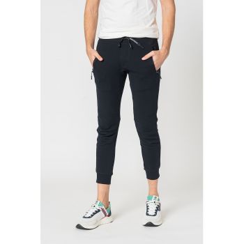 Pantaloni sport conici cu buzunare cu fermoar