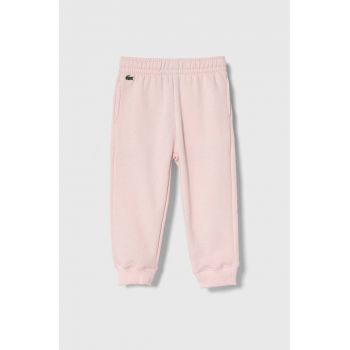 Lacoste pantaloni de trening pentru copii culoarea roz, neted ieftini
