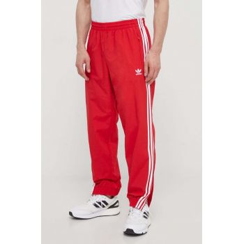 adidas Originals pantaloni de trening Adicolor Woven Firebird Track top culoarea roșu, cu imprimeu, IT2498