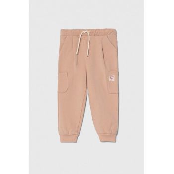 United Colors of Benetton pantaloni de trening pentru copii culoarea roz, neted ieftini