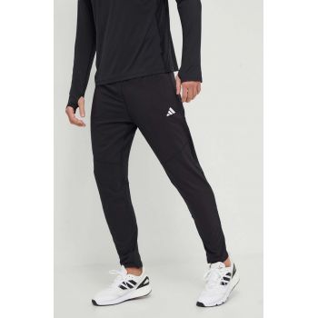 adidas Performance pantaloni de alergare Own the Run culoarea negru, cu imprimeu IK5024 ieftini