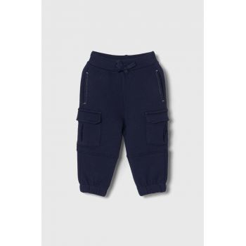United Colors of Benetton pantaloni de trening din bumbac pentru copii culoarea albastru marin, neted