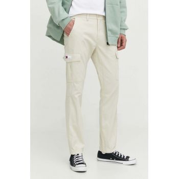 Tommy Jeans pantaloni barbati, culoarea bej, mulata