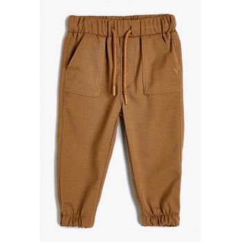 Pantaloni cu terminatii elastice