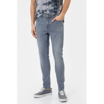 Blugi skinny cu aspect decolorat