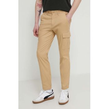 Tommy Jeans pantaloni barbati, culoarea bej, mulata