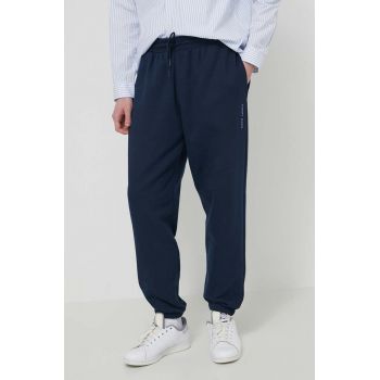 Tommy Jeans pantaloni de trening din bumbac culoarea bleumarin, uni DM0DM18378 ieftini