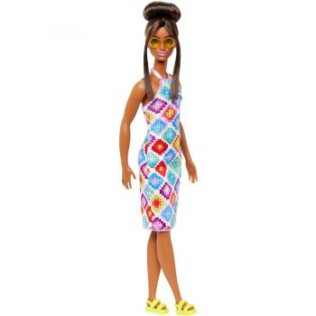 Mattel Fashionistas doll wearing a bun and crocheted dress