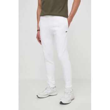 Lacoste pantaloni de trening barbati, culoarea alb, neted de firma originali