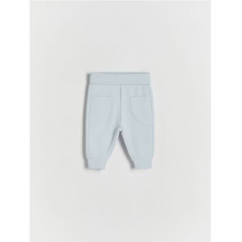 Reserved - Pantaloni din jerseu, cu buzunare - albastru-deschis ieftin