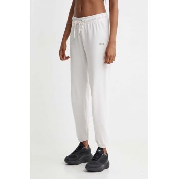 Dkny pantaloni de trening culoarea bej, cu imprimeu