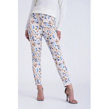 Pantaloni skinny cu imprimeu floral