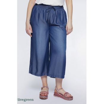 Pantaloni trei sferturi cu buzunare laterale