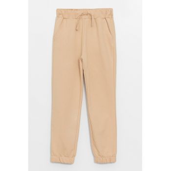 Pantaloni de trening cu buzunare oblice