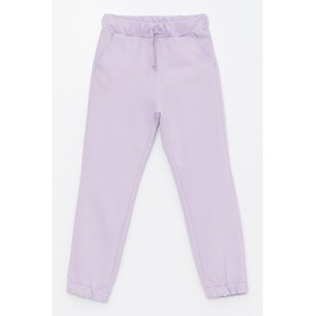 Pantaloni de trening cu buzunare oblice