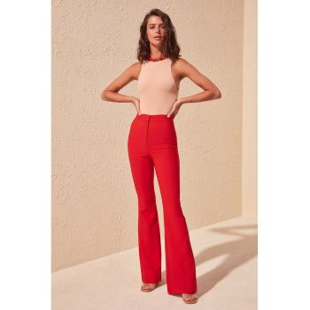 Pantaloni evazati cu talie inalta
