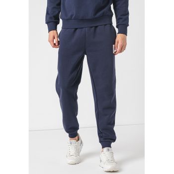 Pantaloni de trening conici cu buzunare oblice