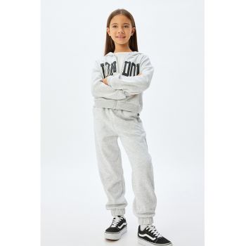 Pantaloni de trening cu croiala conica